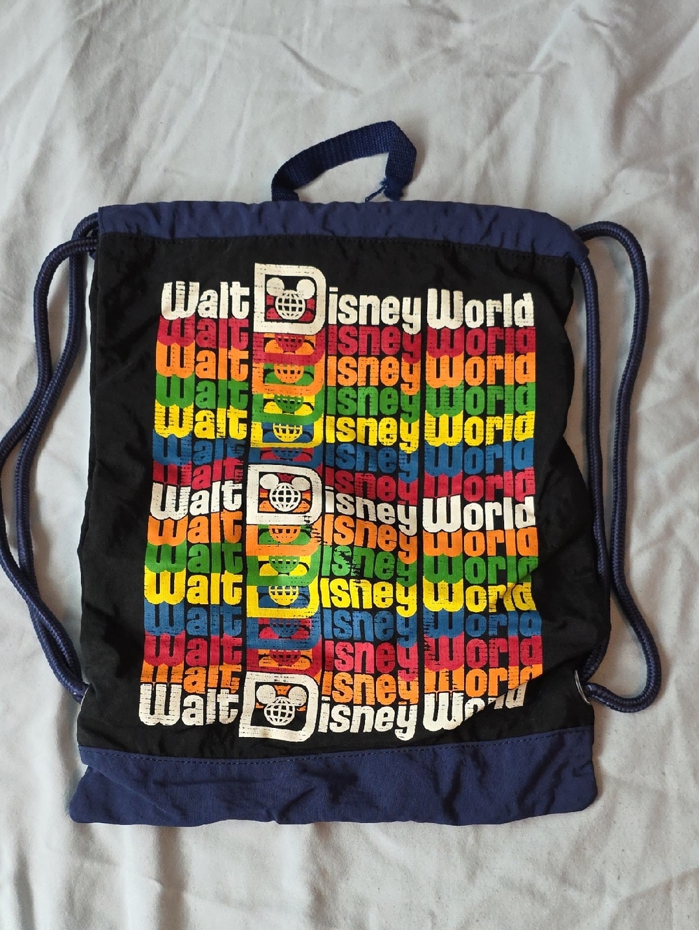 Disney Black Drawstring Backpack with Multicolor Walt Disney World Print